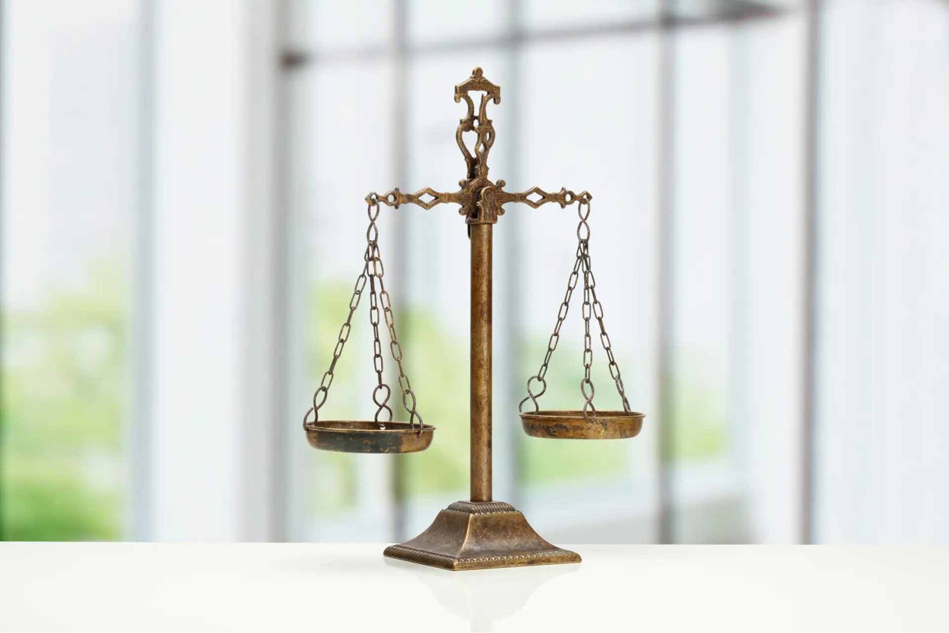 A golden scale, symbolizing balance, fairness, and justice, often used as a metaphor for evaluating and comparing values or principles.